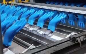 Production Line Image Description 1 Automated production line for industrial safety gloves in our China factory, showing efficient manufacturing processes, strict quality control, and large-scale capacity for cut resistant, nitrile, PU, and latex work gloves